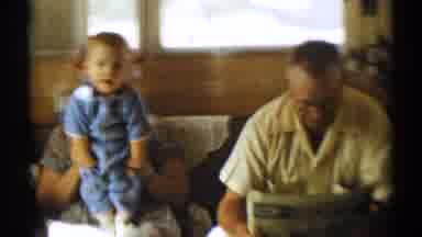 Disneyland California (1959): An Aged Man With Glasses Sits Reading A Newspaper