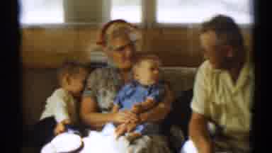 Disneyland California (1959): Little Boy Walks In And Sits With Family On Couch