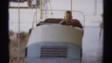 Disneyland California (1959): Little Boy Pretends To Drive Car Parked Outside On A