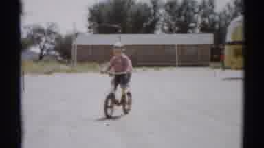 Disneyland California (1959): Boy Riding A Bicycle