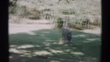 Disneyland California (1959): Grandma And Boy Spending Time Outside In Backyard