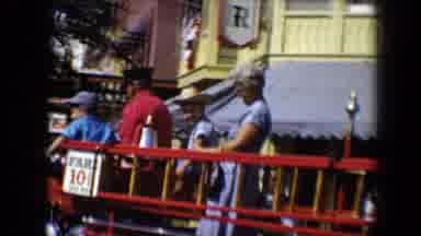 Disneyland California (1959): Horse Drawn Fire Wagon Parades Down Street While Man