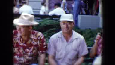 Disneyland California (1959): Two Men And One Woman Resting On A Bench While A