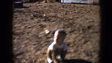 Disneyland California (1959): Child Playing In The Dirt Outside By Himself