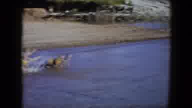 Disneyland California (1959): Two Boys In Swimming Trunks With Flotation Devices