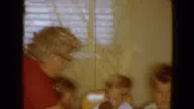 Disneyland California (1959): Grandma Feeding Kids In High Chair An Apple, Aged