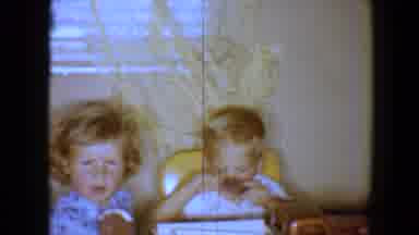 Disneyland California (1959): Children Sitting On Chairs In A Kitchen Eating A