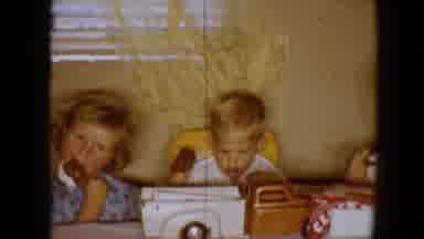 Disneyland California (1959): Three Children Sat Around A Table With A Toy Truck,