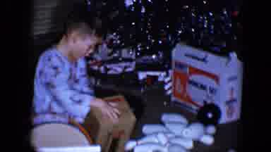 Disneyland California (1959): Two Little Boys Surrounded By Presents Sitting Near