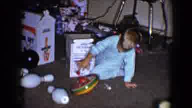 Disneyland California (1959): A Little Boy Is Opening Presents With A Christmas