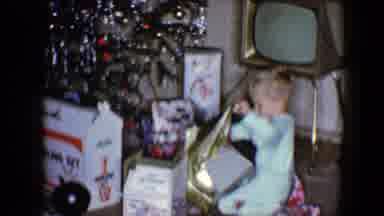 Disneyland California (1959): Toddler Surrounded By Presents Near Christmas Tree