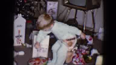 Disneyland California (1959): Boy Happily Playing With All The Toys Santa Claus