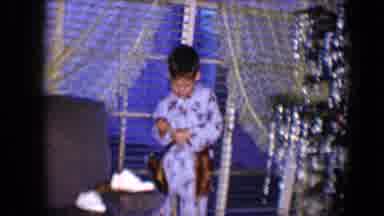 Disneyland California (1959): Little Boy Is Putting On A Belt With Fake Guns Tied