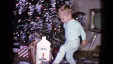 Disneyland California (1959): Boy Looking At His Christmas Gifts