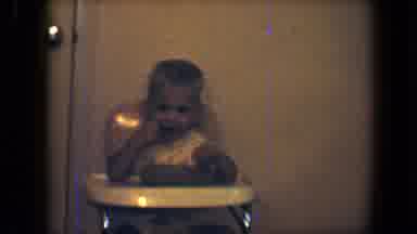 Disneyland California (1959): Toddler Sitting In A Metal High Chair Using A Spoon