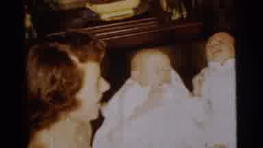 Gary Indiana USA (1961): Women Hold Crying Infant Twins Dressed In White
