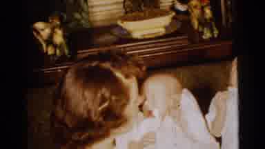 Gary Indiana USA (1961): Brown Haired Woman Holds And Talks To Baby As Man Moves