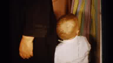 Gary Indiana USA (1961): Little Blond Boy In Bow Tie And Suit Walking Among