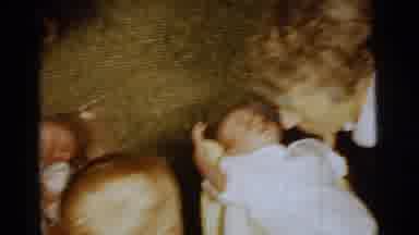 Gary Indiana USA (1961): An Older Woman And Young Mother Hold Two Babies As A