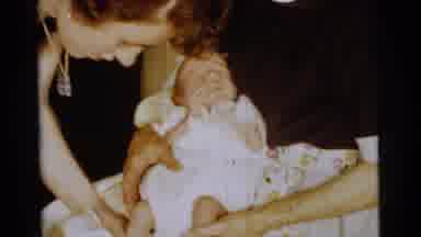 Gary Indiana USA (1961): Mothers Dressing Their Fussy Newborn Babies At A Family