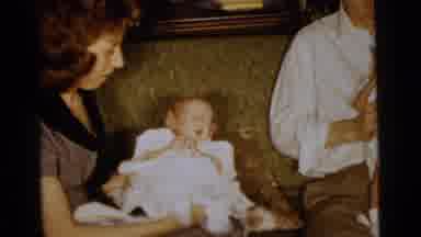 Gary Indiana USA (1961): A Family Is Trying To Hold And Take Care Of Some Babies