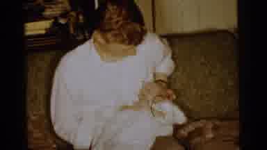 Gary Indiana USA (1961): Man Holding A Baby Is Given Another Woman Smokes Holding