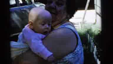 Gary Indiana USA (1961): Grandparents In Front Yard Holding Their Grandchild