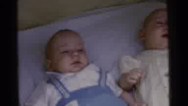 Gary Indiana USA (1961): Two Infants Lay In A Crib One Boy The Other Girl The