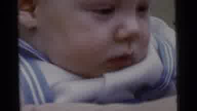 Gary Indiana USA (1961): Infant Wearing Blue And White Shirt Laughs For Camera Man