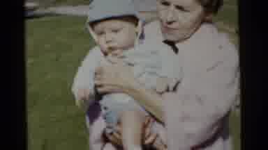 Gary Indiana USA (1961): Two Women Each Holding A Baby Outside On A Sunny Day