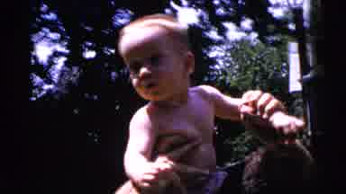 Gary Indiana USA (1961): Son Riding On Father's Back And Playing Hitting Father On