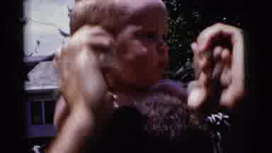 Gary Indiana USA (1961): Small Child On The Shoulders Of A Man Holding His Hands