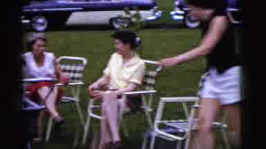 Gary Indiana USA (1961): People Are Playing Badminton On Grass Outside On A Sunny