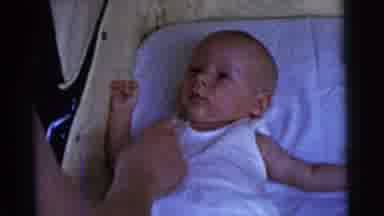 Gary Indiana USA (1961): Footage Shows A Woman Tickling A Baby's Nose In A Pram