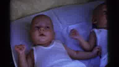 Gary Indiana USA (1961): Two Newborn Babies Wiggling Their Arms And Legs While