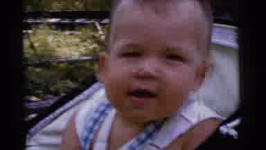 Gary Indiana USA (1961): Little Baby Smiles In His Stroller Outside During Summer