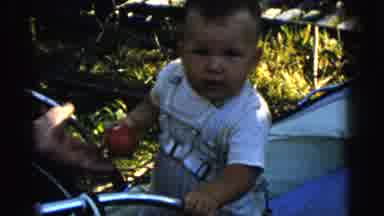 Gary Indiana USA (1961): Footage Of A Baby Boy In Dungarees Smiling For The Camera