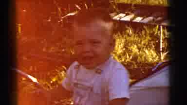 Gary Indiana USA (1961): Toddler Wearing White Shirt Laughing At Cameraman On A