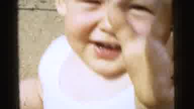 Gary Indiana USA (1961): The Little Toddler Walks Around And Then Reaches For The