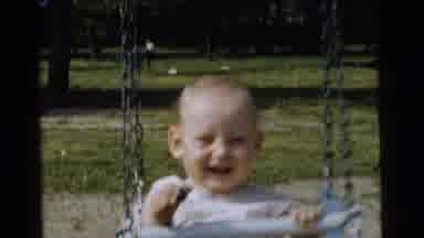 Gary Indiana USA (1961): Smiling Baby On A Swing