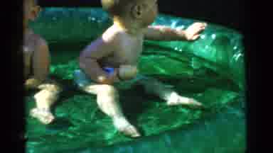 Gary Indiana USA (1961): Cute Little Kids Sitting In A Small Blow Up Swimming Pool