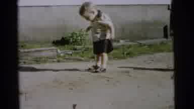 Gary Indiana USA (1961): Baby Boy Standing Trying To Walk Making Faces He Is So
