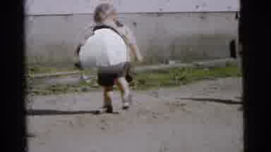 Gary Indiana USA (1961): Little Girl Walking Next To Water Cuts To Women And Boy