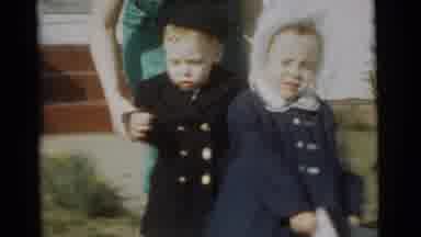 Gary Indiana USA (1961): Young Toddlers, A Boy And A Girl, With Parents In The