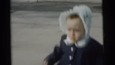 Gary Indiana USA (1961): A Boy And A Girl Running Around Outside In Their Coats
