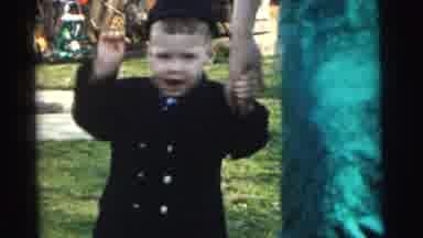 Gary Indiana USA (1961): Upset Boy Walking Holding Hand Of Mother In Green Park