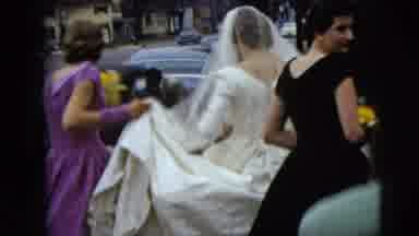 Moline Illinois USA (1962): Bridesmaids Holding Bright Yellow Flowers Helping A