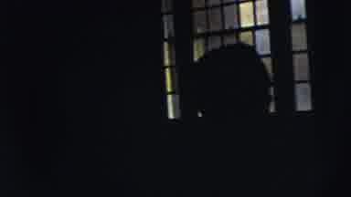 Moline Illinois USA (1962): Dark Scene Of Silhouetted People Walking In Front Of