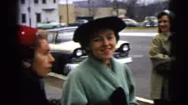 Moline Illinois USA (1962): Women Chat Beside A Busy Street Waiting For Transport
