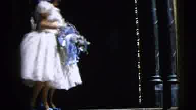 Moline Illinois USA (1962): Two Women Dressed In White Dressed And Holding Flowers